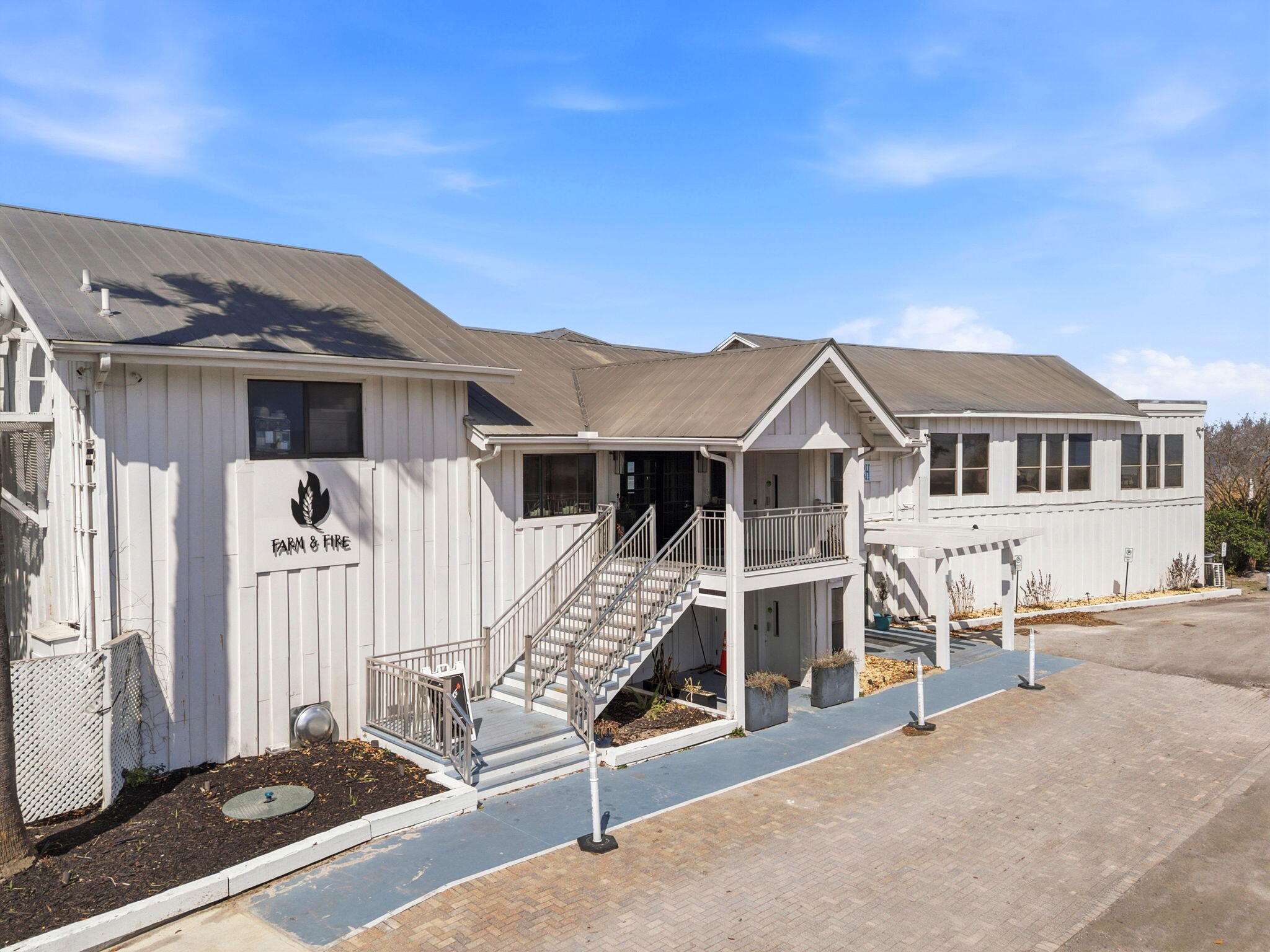 128 Bay Magnolia Lane Santa Rosa Beach, FL 32459 - Photo 57 of 61 a front view of a house with a porch