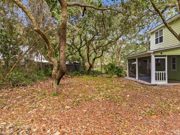 a house view with a backyard space