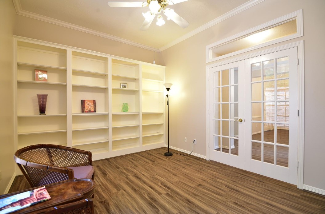34 Reflection Point The Woodlands, TX 77381 - Photo 8 of 42 Built-in Shelves in Study
