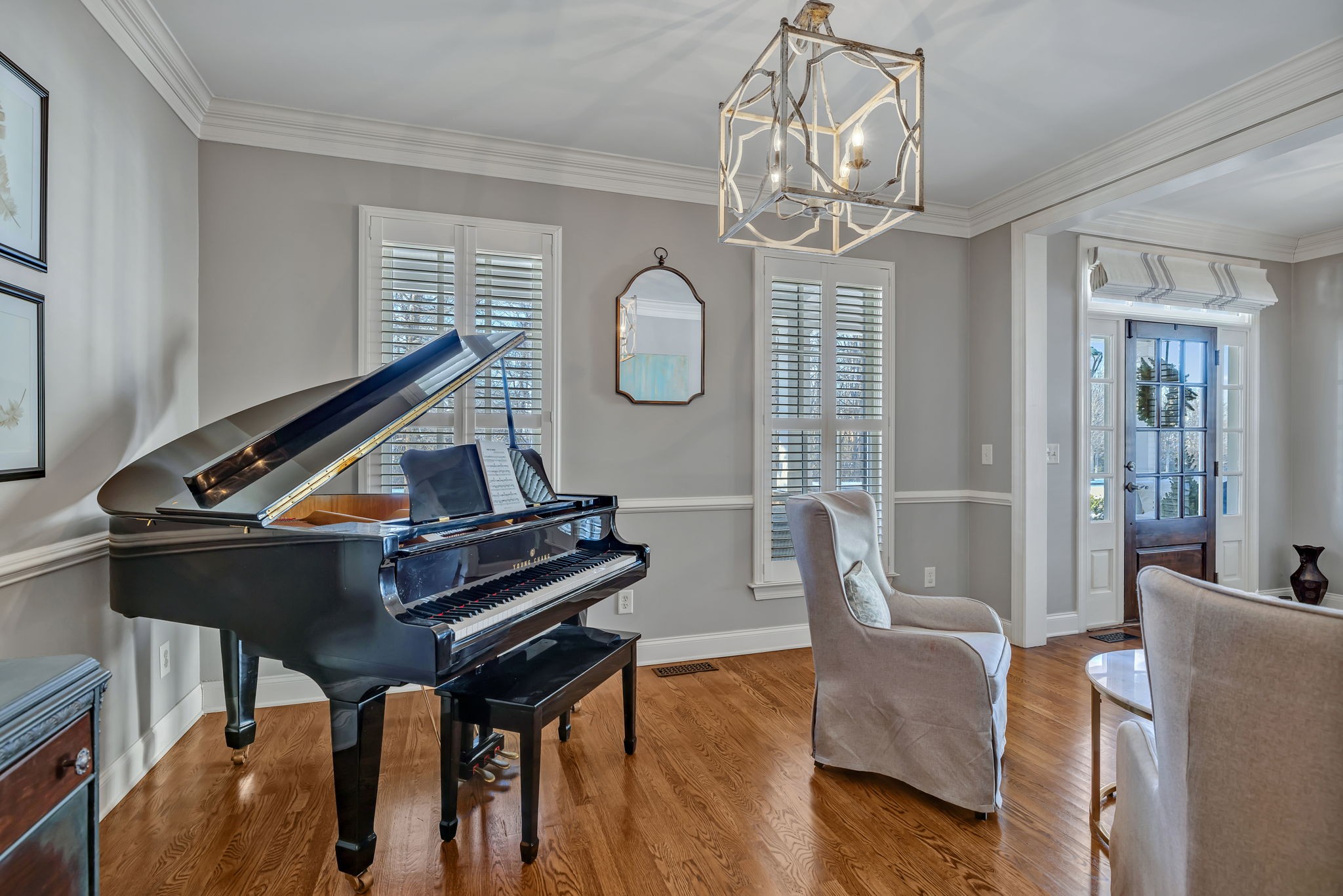 1302 Jewell Avenue Franklin, TN 37064 - Photo 11 of 68 a living room with furniture and a chandelier