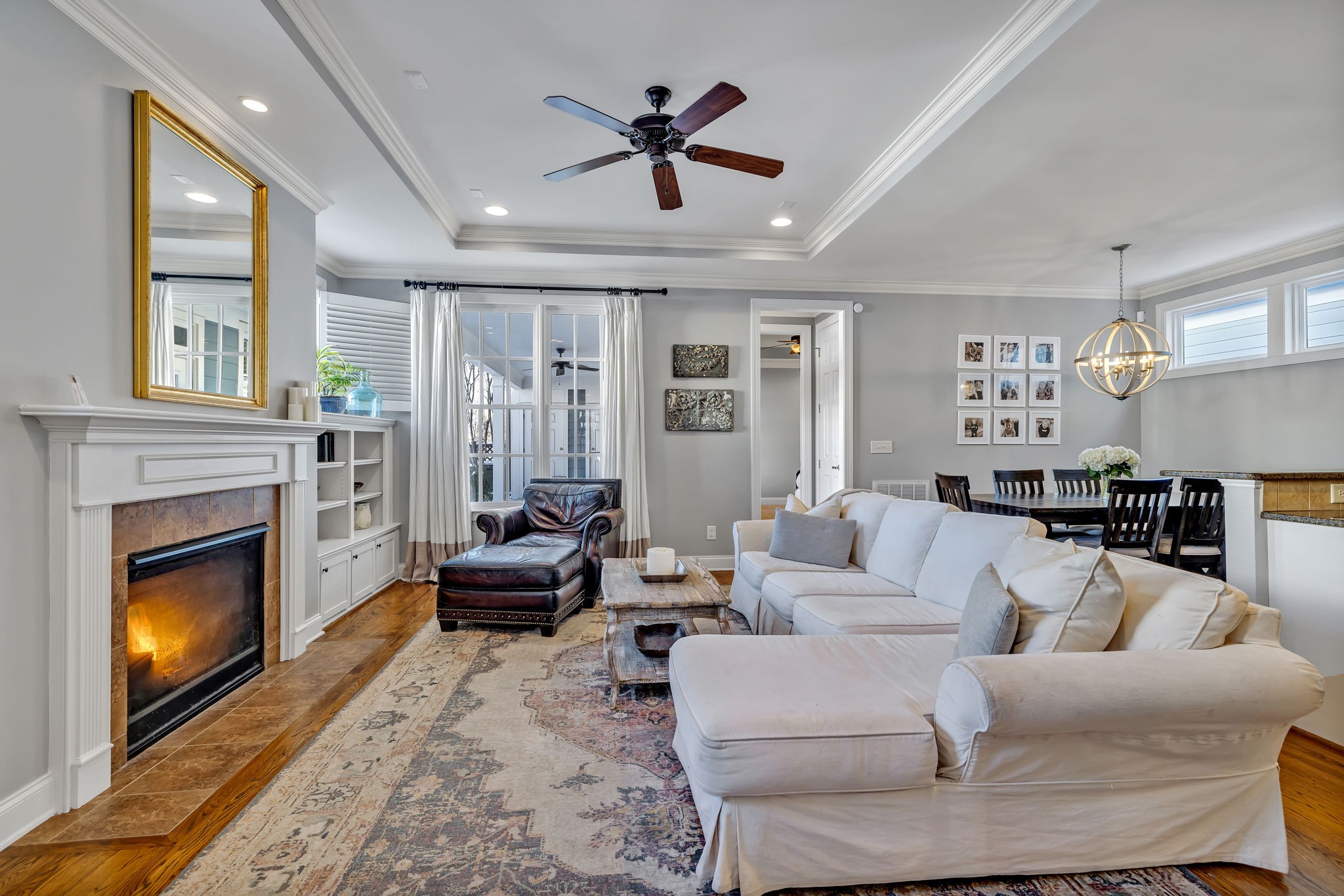 1302 Jewell Avenue Franklin, TN 37064 - Photo 16 of 68 a living room with furniture a fireplace and a large window