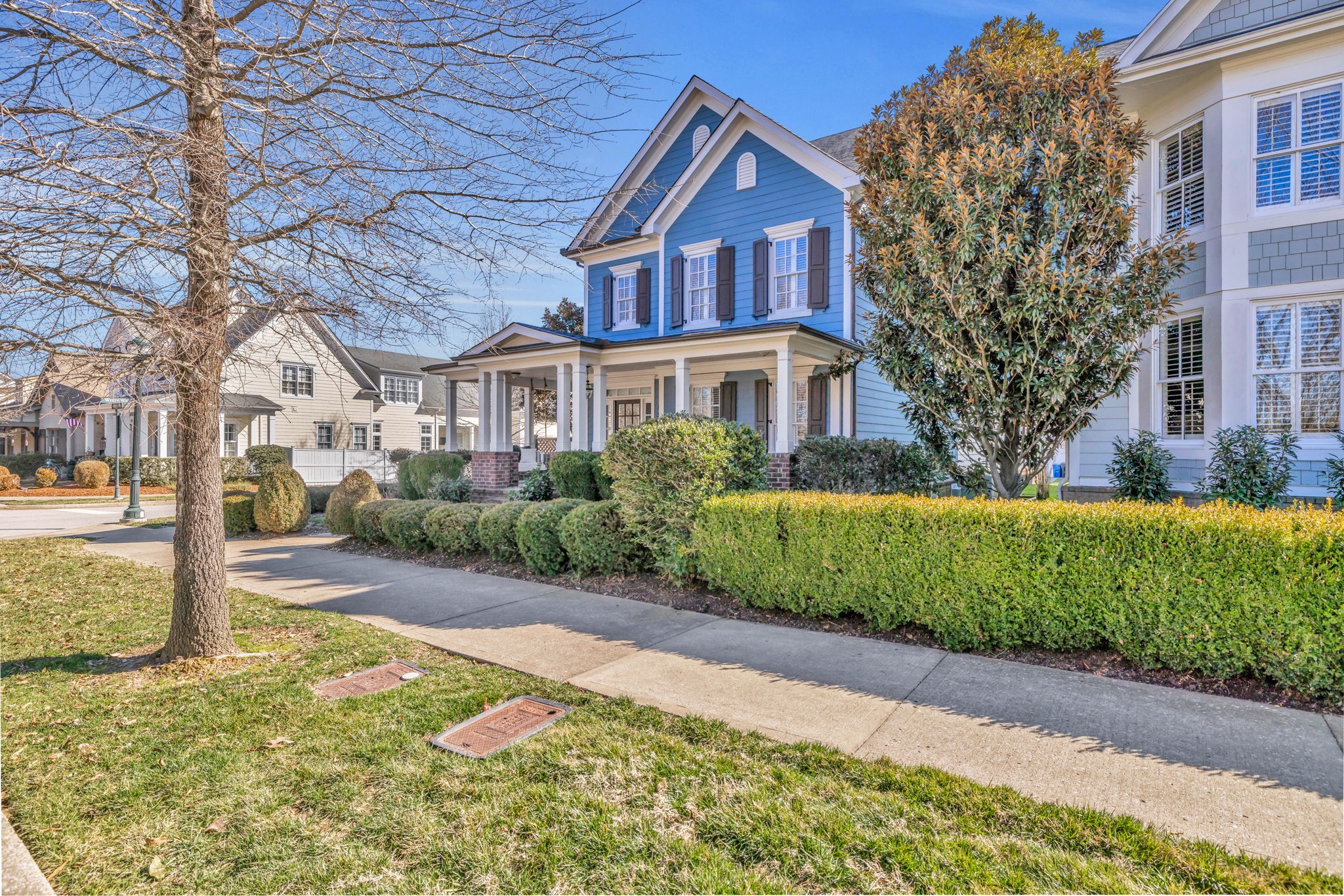 1302 Jewell Avenue Franklin, TN 37064 - Photo 2 of 68 a front view of a house with a garden