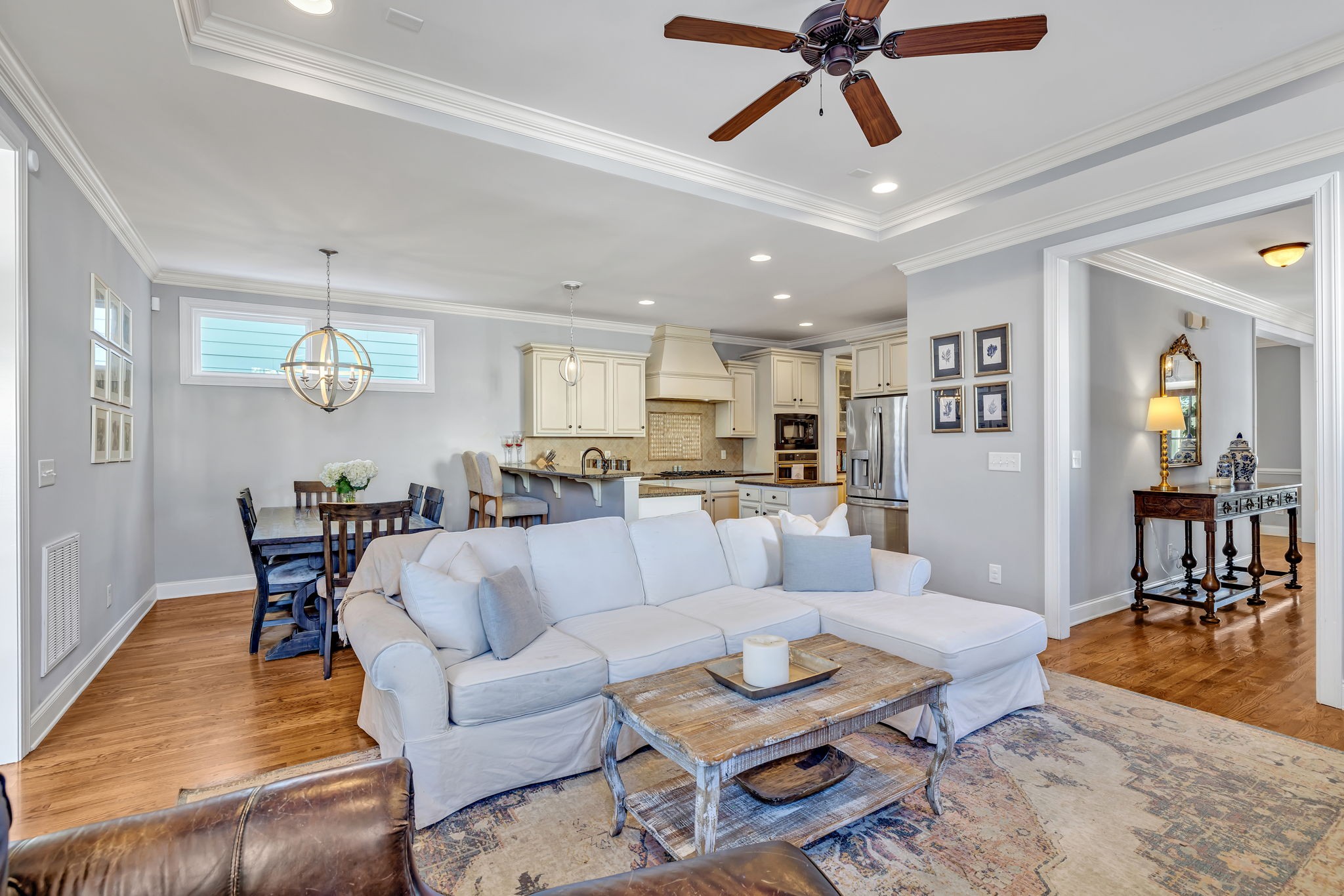 1302 Jewell Avenue Franklin, TN 37064 - Photo 23 of 68 a living room with furniture and a dining table with kitchen view