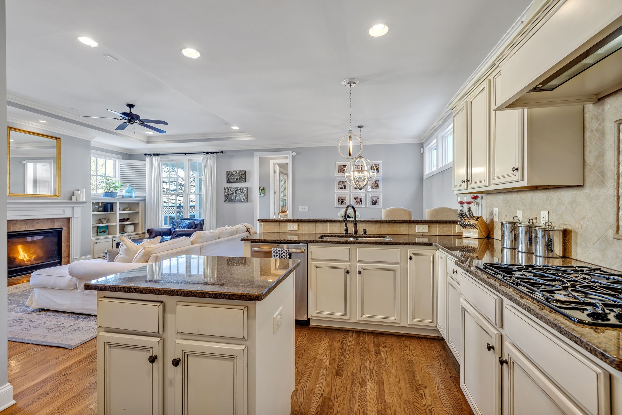 1302 Jewell Avenue Franklin, TN 37064 - Photo 31 of 68 a kitchen with granite countertop a sink stainless steel appliances and cabinets