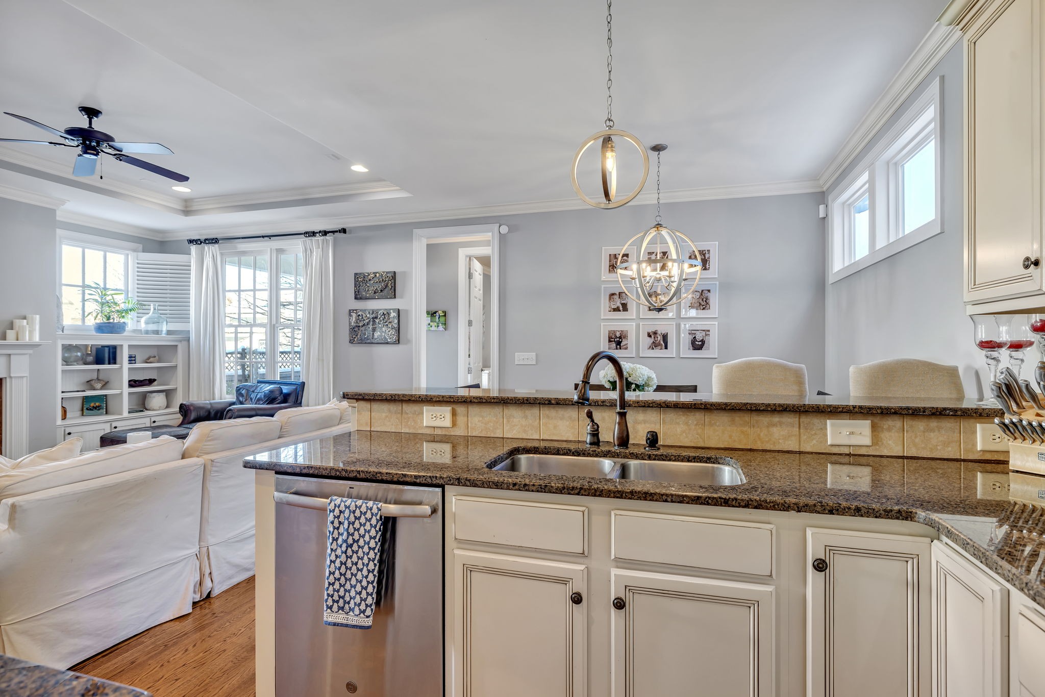 1302 Jewell Avenue Franklin, TN 37064 - Photo 33 of 68 a kitchen with kitchen island granite countertop a sink cabinets and window
