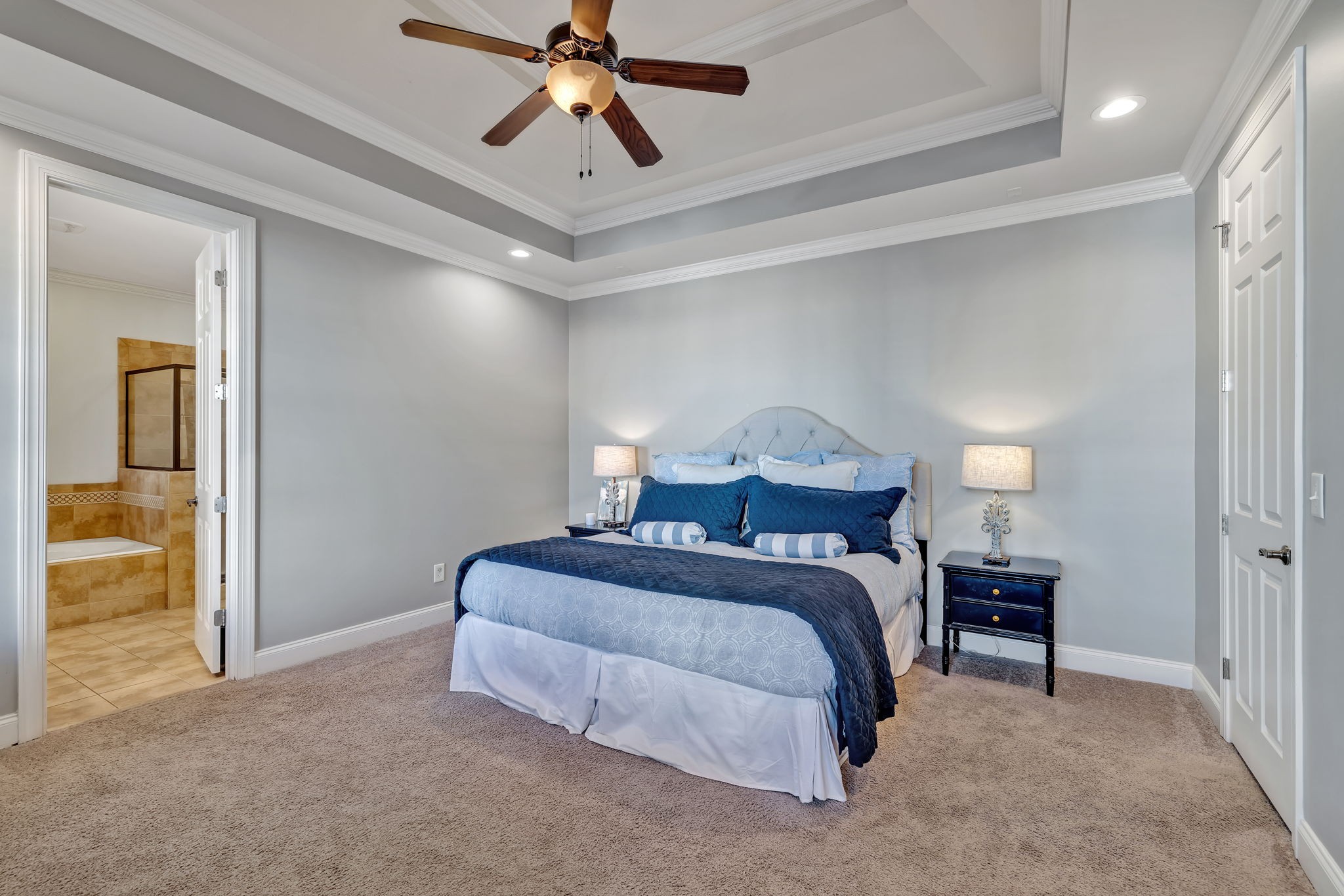 1302 Jewell Avenue Franklin, TN 37064 - Photo 38 of 68 a bedroom with a bed and a chandelier