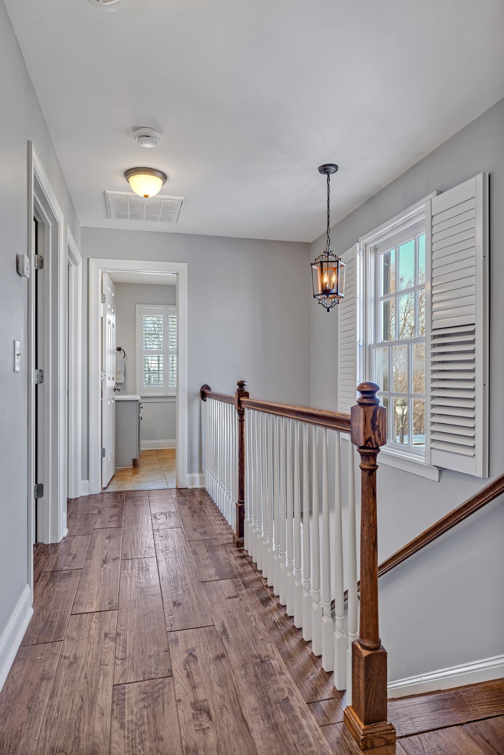 1302 Jewell Avenue Franklin, TN 37064 - Photo 50 of 68 a view of a hallway with wooden floor and stairs