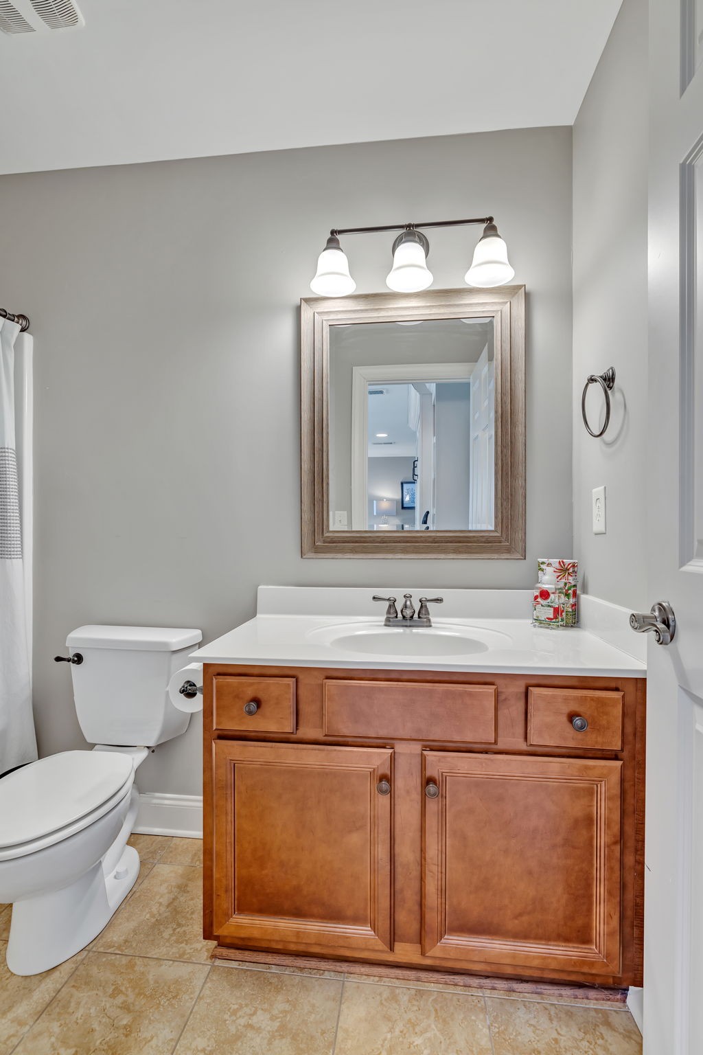1302 Jewell Avenue Franklin, TN 37064 - Photo 63 of 68 a bathroom with a sink and a mirror