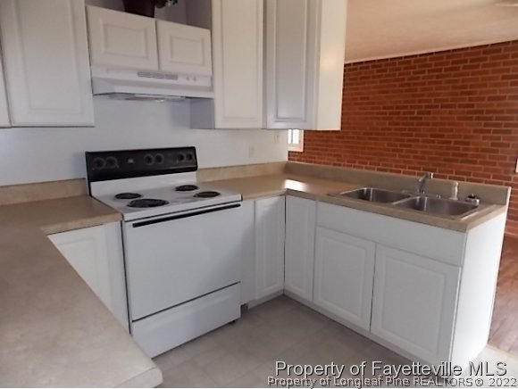 3697 Union Church Road Carthage, NC 28327 - Photo 5 of 25 a kitchen with stainless steel appliances granite countertop a sink stove and cabinets