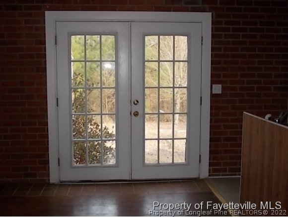 3697 Union Church Road Carthage, NC 28327 - Photo 8 of 25 a view of an empty room with wooden floor and a window