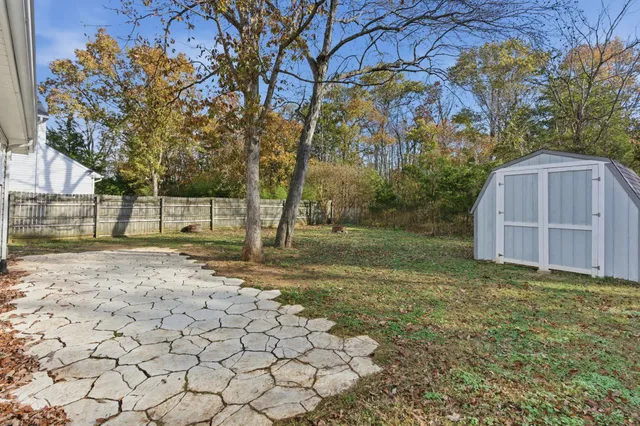 a view of backyard with green space