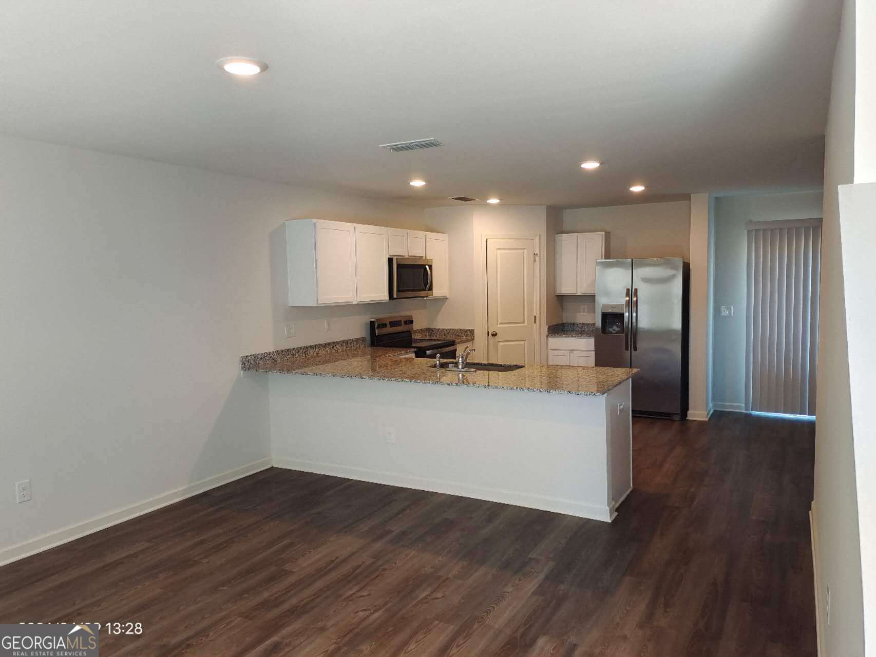 538 Pemberton Street Euharlee, GA 30145 - Photo 2 of 13 a view of kitchen with wooden floor