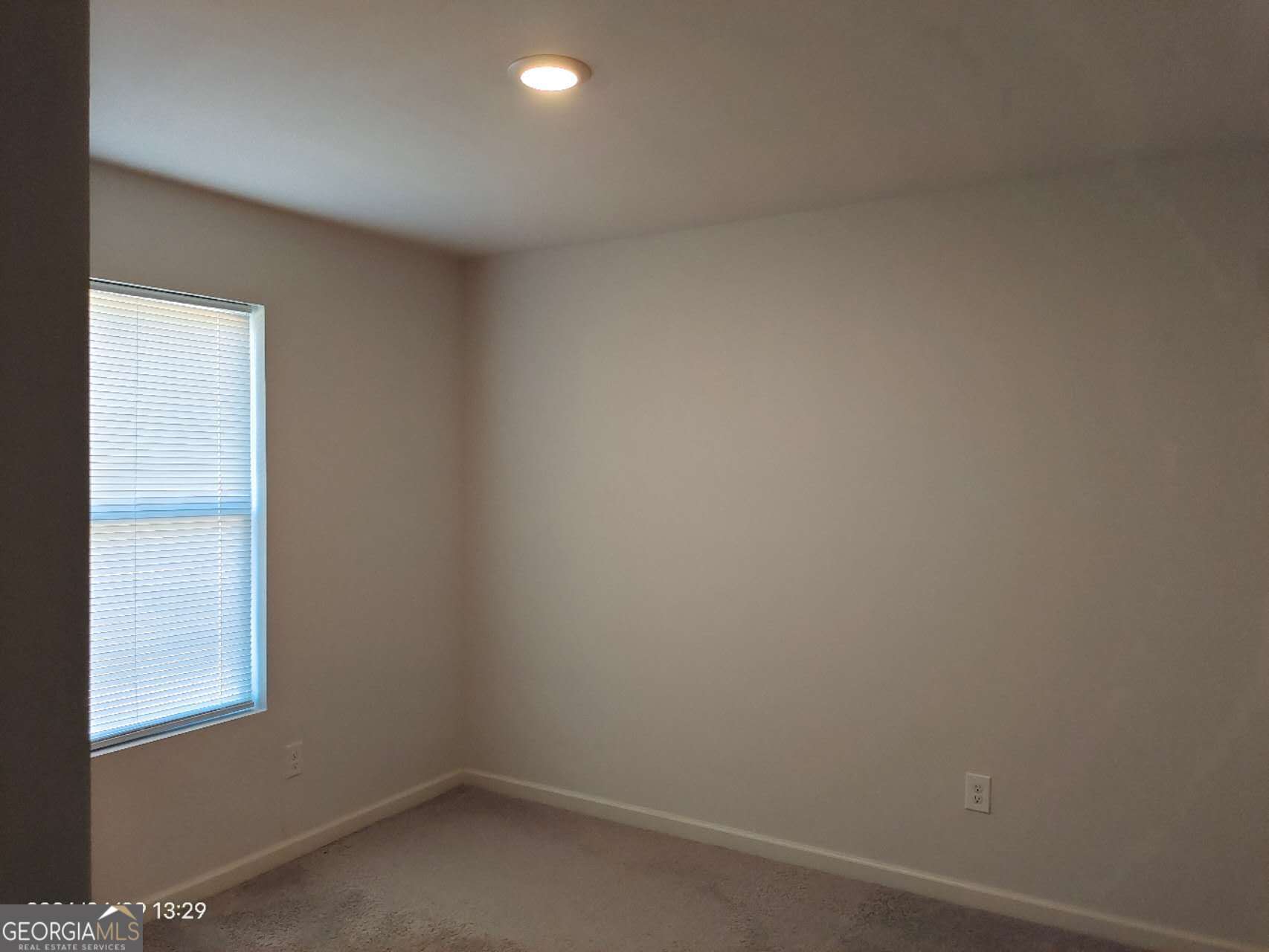 538 Pemberton Street Euharlee, GA 30145 - Photo 4 of 13 a view of a small space with wooden floor and a window