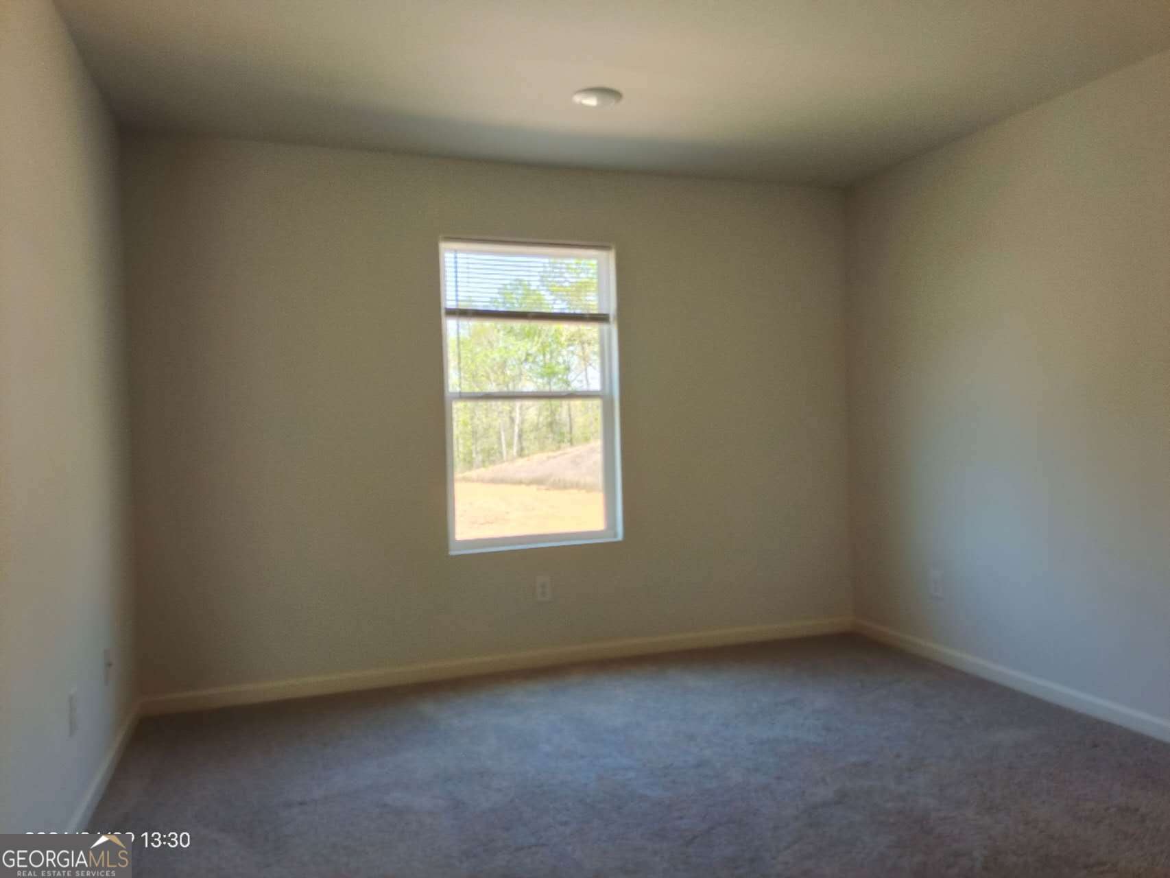 538 Pemberton Street Euharlee, GA 30145 - Photo 7 of 13 an empty room with a window
