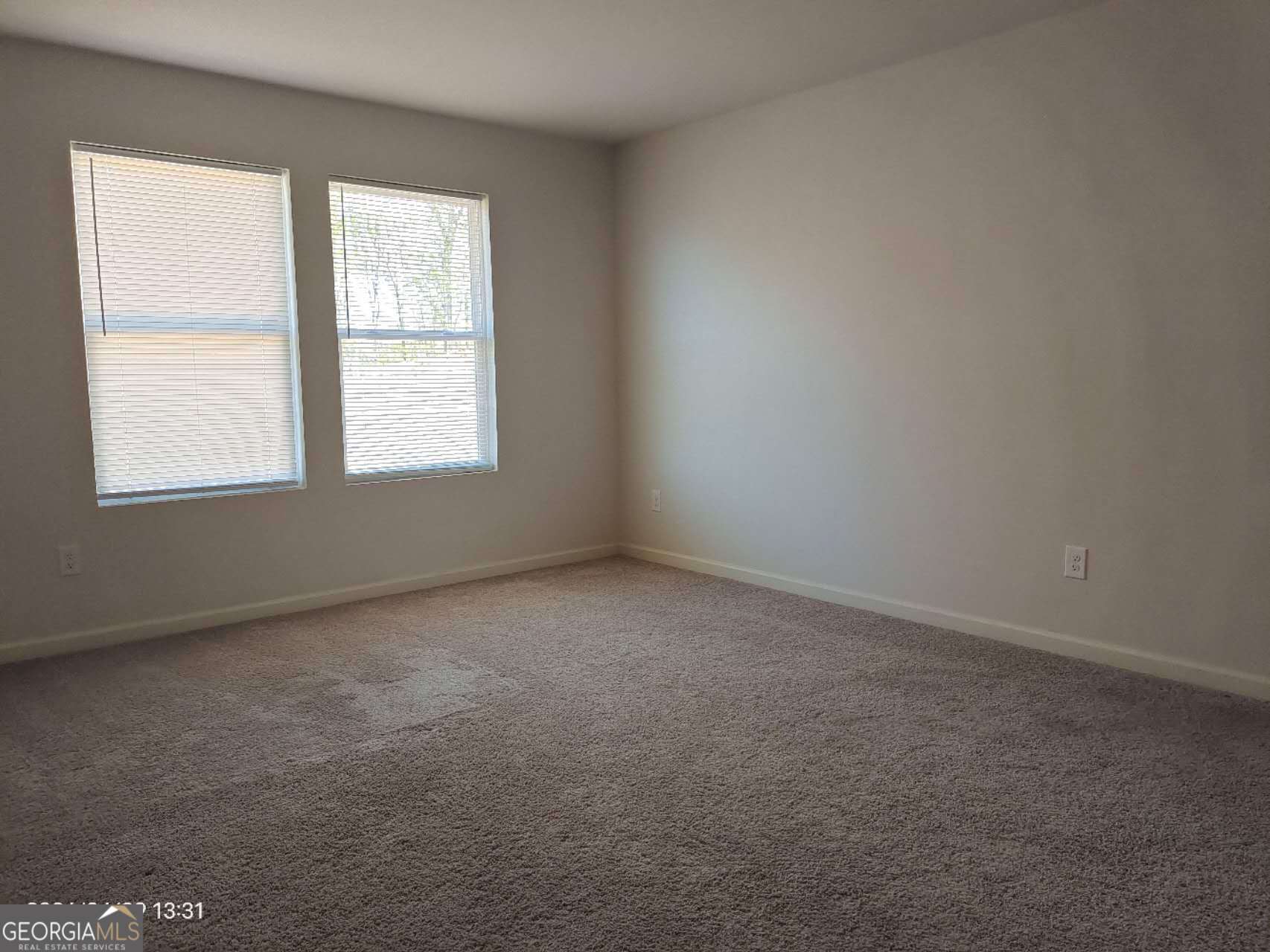 538 Pemberton Street Euharlee, GA 30145 - Photo 8 of 13 an empty room with a window