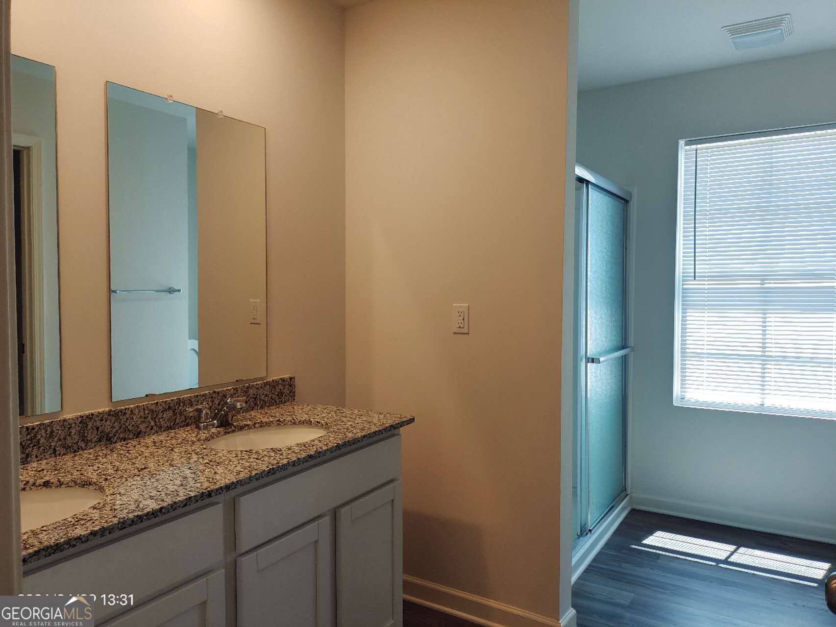 538 Pemberton Street Euharlee, GA 30145 - Photo 9 of 13 a bathroom with a granite countertop sink and a mirror