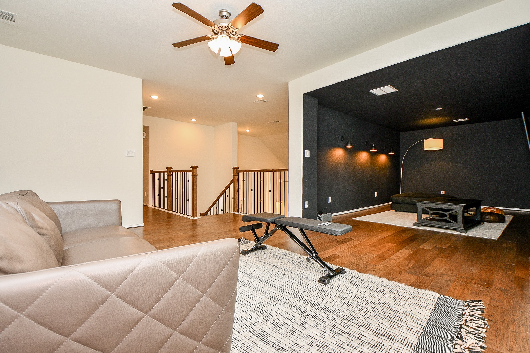 4523 Juniper Ridge Lane Manvel, TX 77578 - Photo 25 of 38 a living room with furniture and a flat screen tv