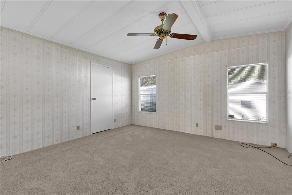 415 South Timber Trail Wildwood, FL 34785 - Photo 19 of 52 an empty room with a window