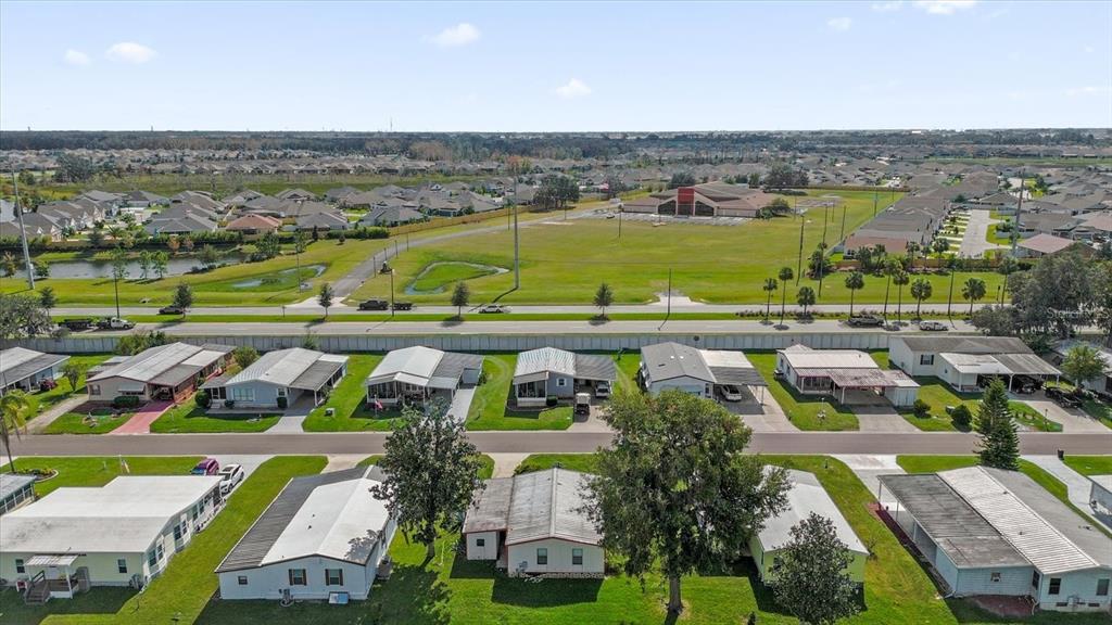 415 South Timber Trail Wildwood, FL 34785 - Photo 38 of 52 an aerial view of a city