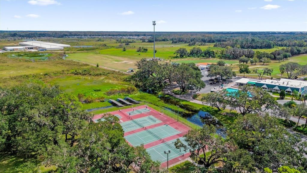 415 South Timber Trail Wildwood, FL 34785 - Photo 41 of 52 a view of a city with an ocean