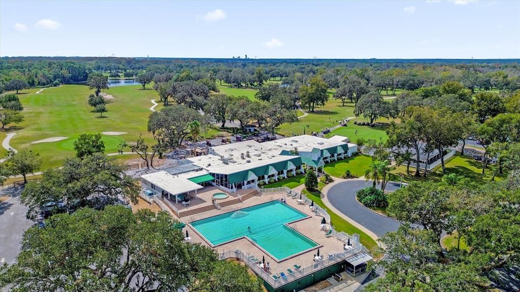 415 South Timber Trail Wildwood, FL 34785 - Photo 45 of 52 an aerial view of a house with a garden