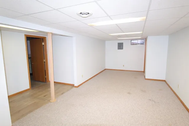 a bathroom with a sink mirror toilet and shower