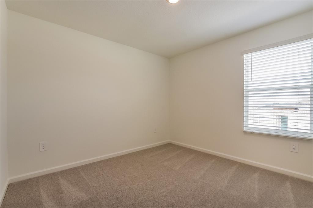 3608 Rolling Rdg Bend Davenport, FL 33837 - Photo 9 of 21 an empty room with a window