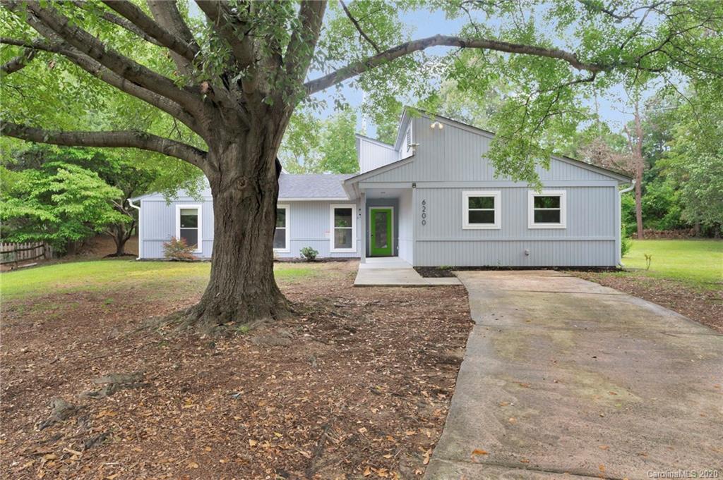 6200 Ropley Court Charlotte, NC 28211 - Photo 2 of 30 a house with trees in front of it