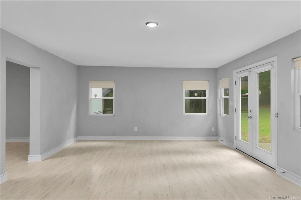 6200 Ropley Court Charlotte, NC 28211 - Photo 14 of 30 a view of an empty room with glass door