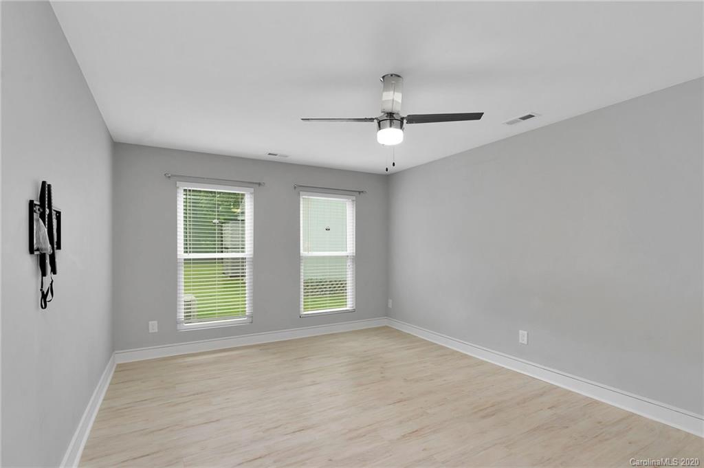 6200 Ropley Court Charlotte, NC 28211 - Photo 16 of 30 a view of an empty room with a window
