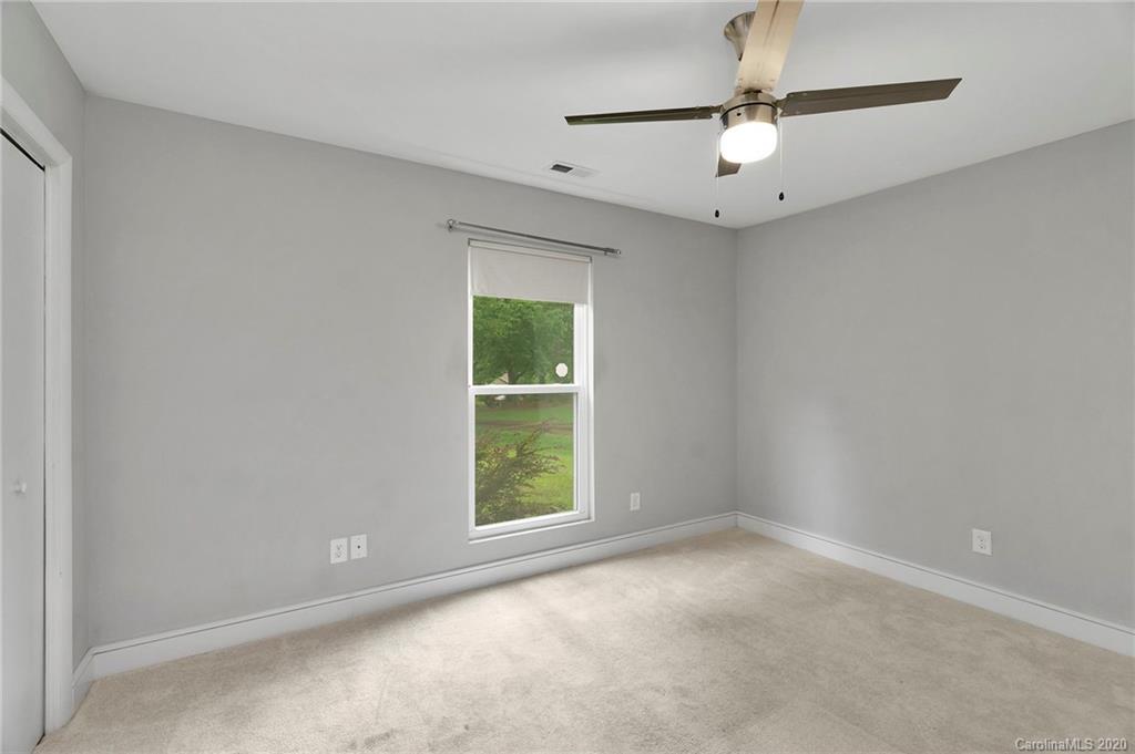 6200 Ropley Court Charlotte, NC 28211 - Photo 22 of 30 an empty room with a window