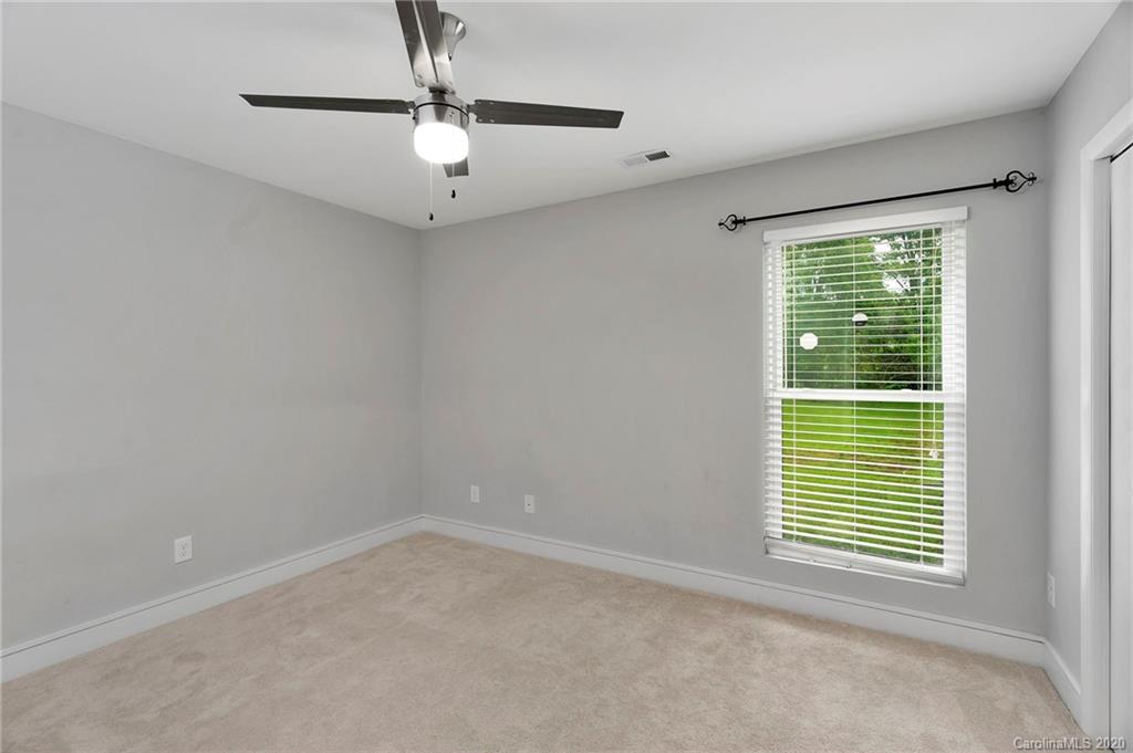 6200 Ropley Court Charlotte, NC 28211 - Photo 23 of 30 a view of an empty room with a window