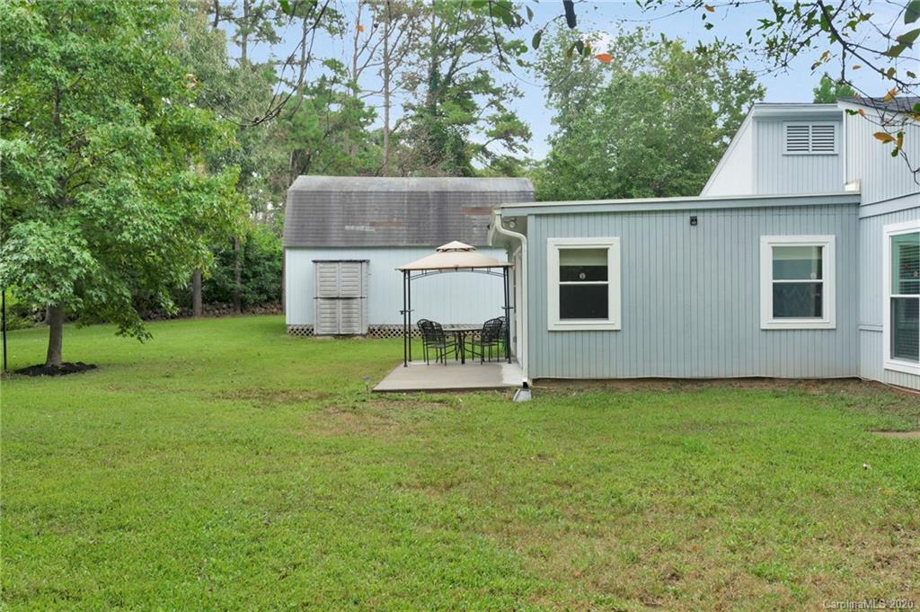 6200 Ropley Court Charlotte, NC 28211 - Photo 26 of 30 a view of a house with a yard