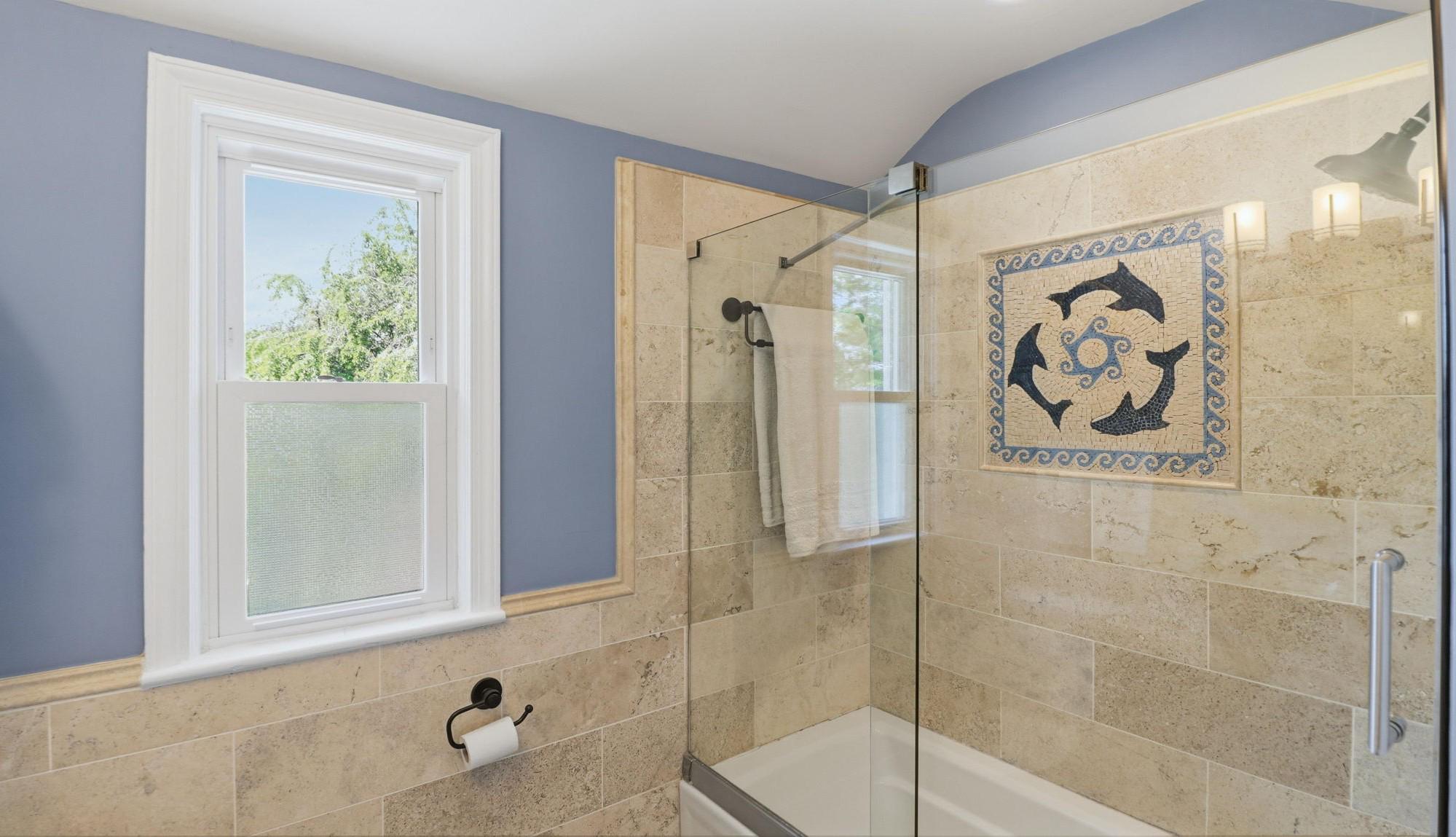 11708 Galt Avenue Silver Spring, MD 20902 - Photo 14 of 25 Elegant bathroom with mosaic accents.