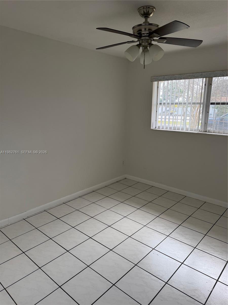 14865 Southwest 302nd Street Homestead, FL 33033 - Photo 9 of 18 a view of a window in an empty room