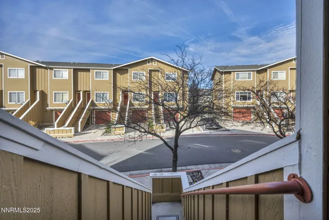 a view of swimming pool with seating space