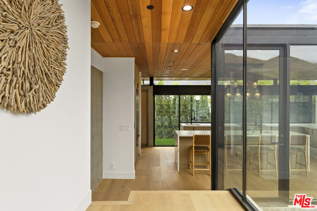 5707 Busch Drive Malibu, CA 90265 - Photo 10 of 35 a living room with a large window