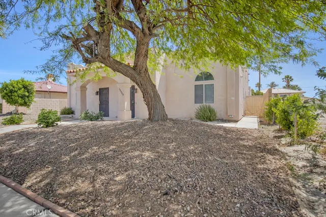 a kitchen with a refrigerator a stove top oven a sink and dishwasher