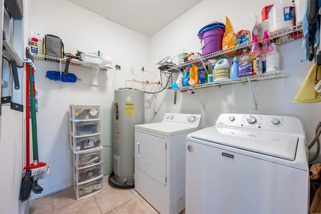 700 Seabrook Court, Unit 201 Altamonte Springs, FL 32714 - Photo 19 of 32 a utility room with dryer and washer