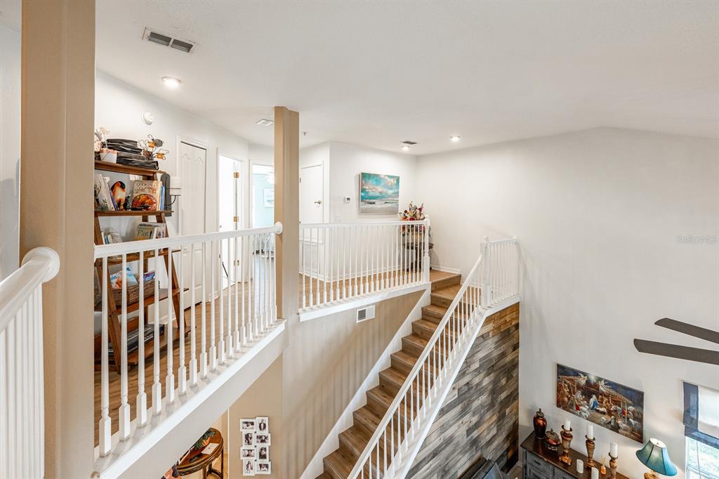 700 Seabrook Court, Unit 201 Altamonte Springs, FL 32714 - Photo 20 of 32 a view of a hallway with workspace