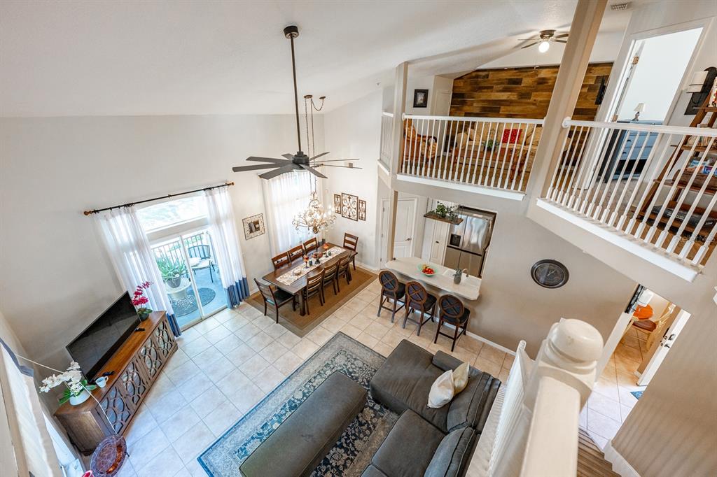 700 Seabrook Court, Unit 201 Altamonte Springs, FL 32714 - Photo 23 of 32 a bedroom with furniture and a window