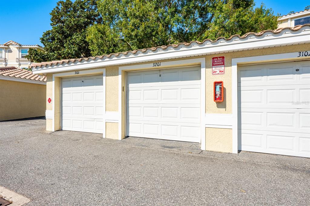 700 Seabrook Court, Unit 201 Altamonte Springs, FL 32714 - Photo 30 of 32 a view of a house with a garage