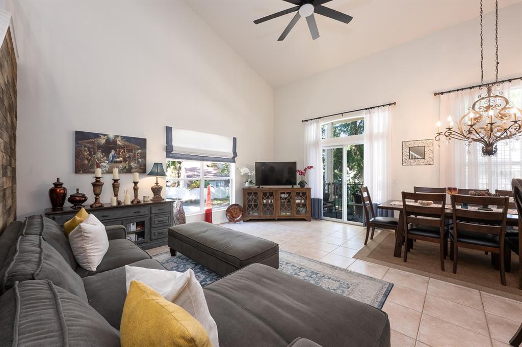 700 Seabrook Court, Unit 201 Altamonte Springs, FL 32714 - Photo 6 of 32 a living room with furniture or couch and a flat screen tv