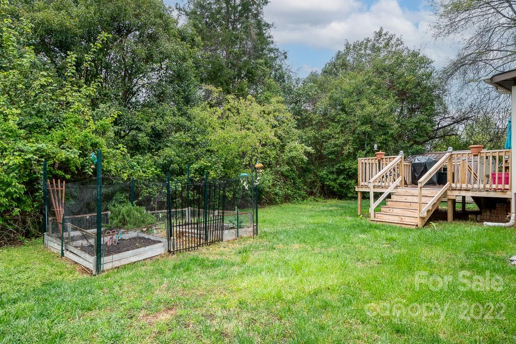 626 Westside Terrace, Unit 5 Davidson, NC 28036 - Photo 17 of 24 a view of a park with a slide