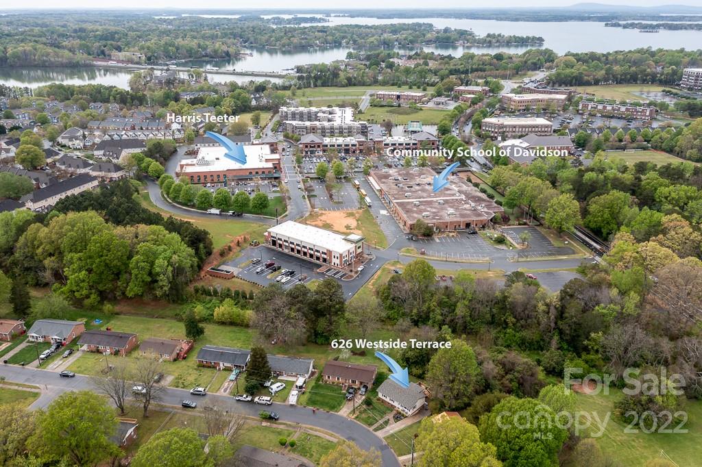 626 Westside Terrace, Unit 5 Davidson, NC 28036 - Photo 20 of 24 an aerial view of residential houses with outdoor space