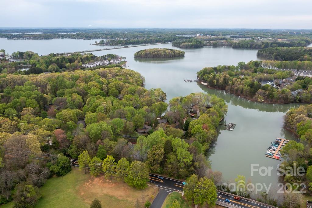 626 Westside Terrace, Unit 5 Davidson, NC 28036 - Photo 21 of 24 a view of a lake with outdoor space