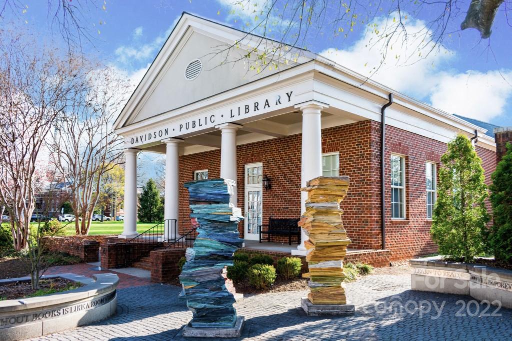626 Westside Terrace, Unit 5 Davidson, NC 28036 - Photo 4 of 24 a front view of a house with a porch