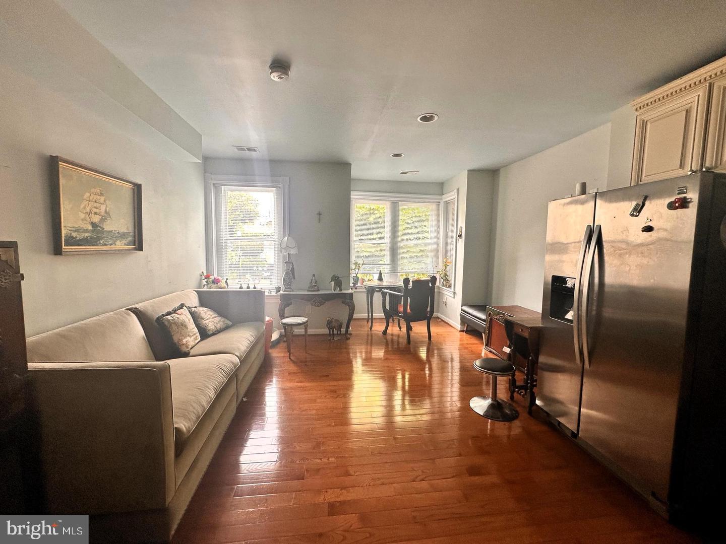 1658 33rd Street Northwest Washington, DC 20007 - Photo 2 of 5 a living room with furniture wooden floor and a table