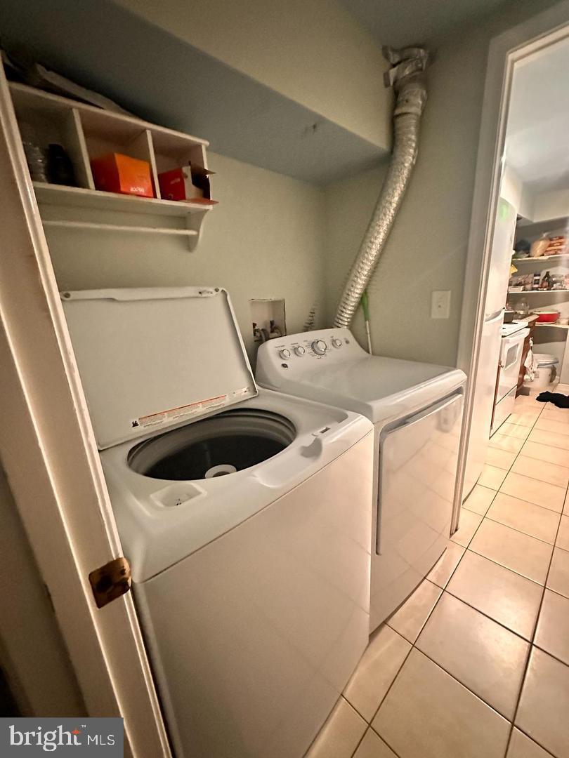 1658 33rd Street Northwest Washington, DC 20007 - Photo 3 of 5 a utility room with dryer and washer