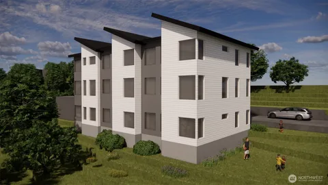 a white building view with a garden space